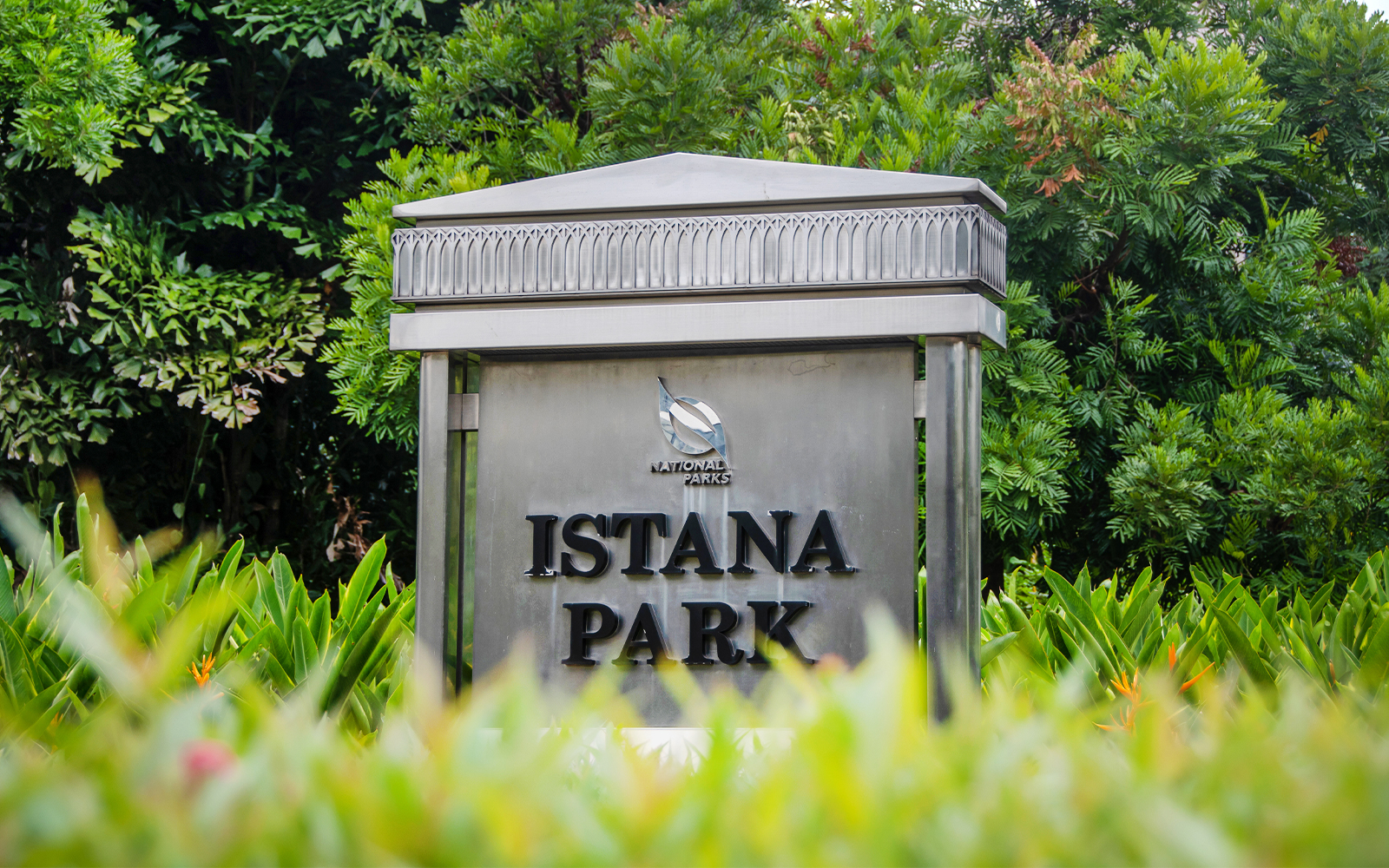 Istana Park Singapore with lush greenery and iconic Festival Arch.