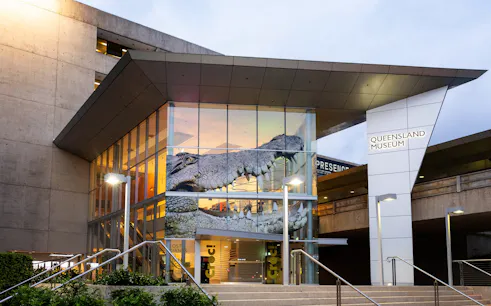 Queensland Museum entrance with large crocodile display for Croc! Lost Giants to Living Legends exhibit.