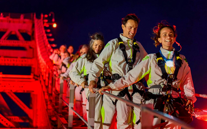Climbers on Story Bridge Adventure Climb at night in Brisbane.