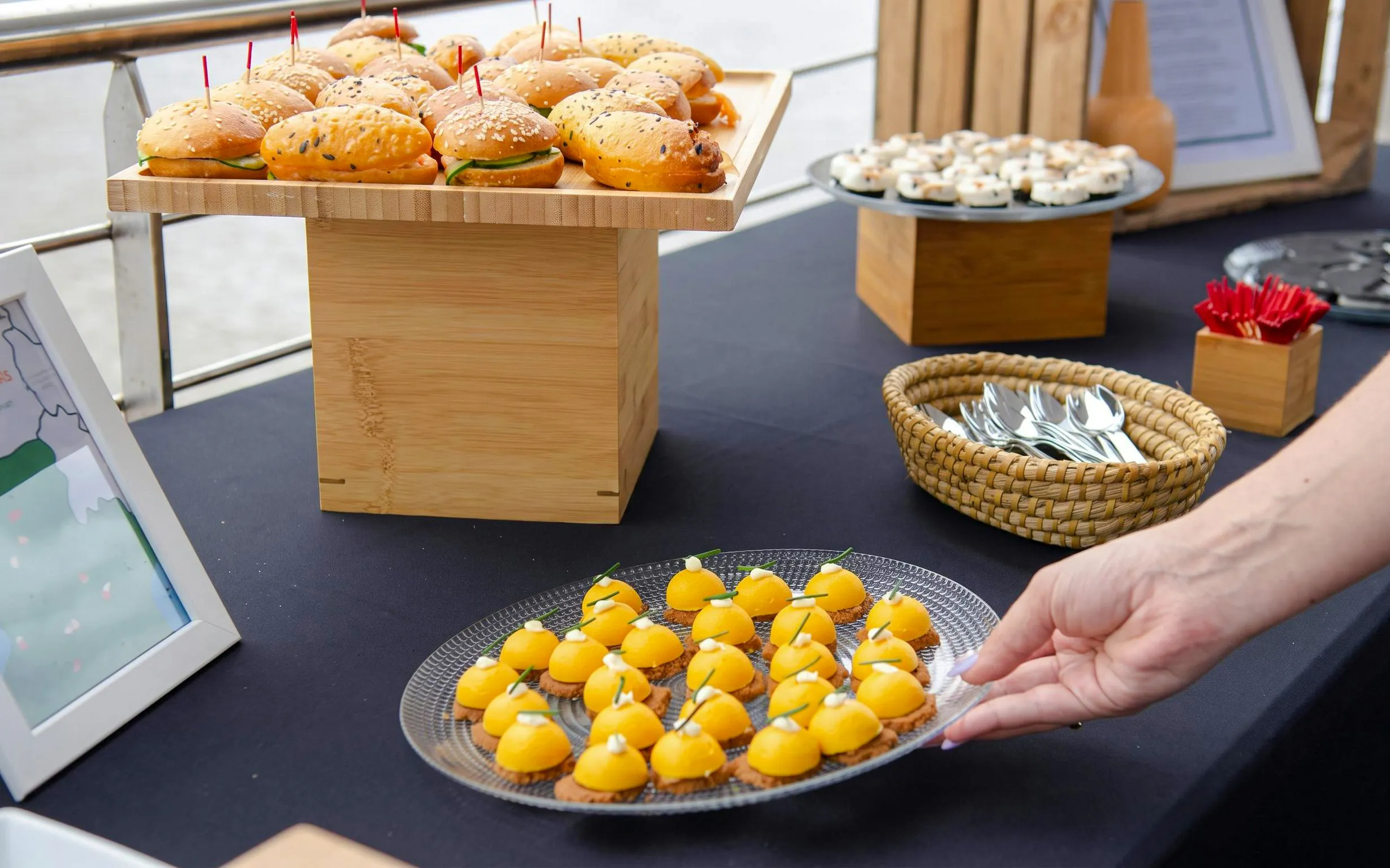 Toulouse Canal du Midi cruise buffet with assorted appetizers and pastries.