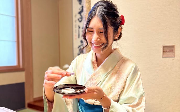 Kimono-clad woman participating in a tea ceremony in Shinagawa, Tokyo.