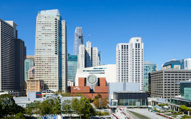 San Francisco Museum of Modern Art with city skyline in the background.
