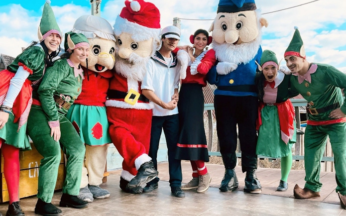 Popeye and characters posing at Popeye Village, Malta.