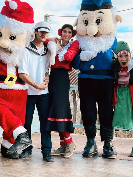 Popeye and characters posing at Popeye Village, Malta.