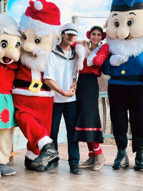 Popeye and characters posing at Popeye Village, Malta.