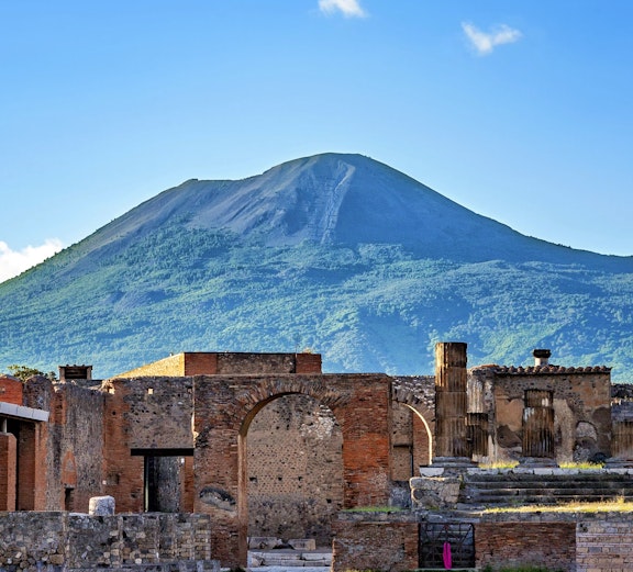 Ancient ruins with Mount Vesuvius in the background, Pompeii, Campania, Italy.