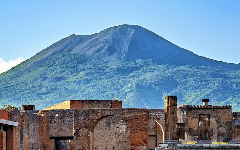 Ancient ruins with Mount Vesuvius in the background, Pompeii, Campania, Italy.