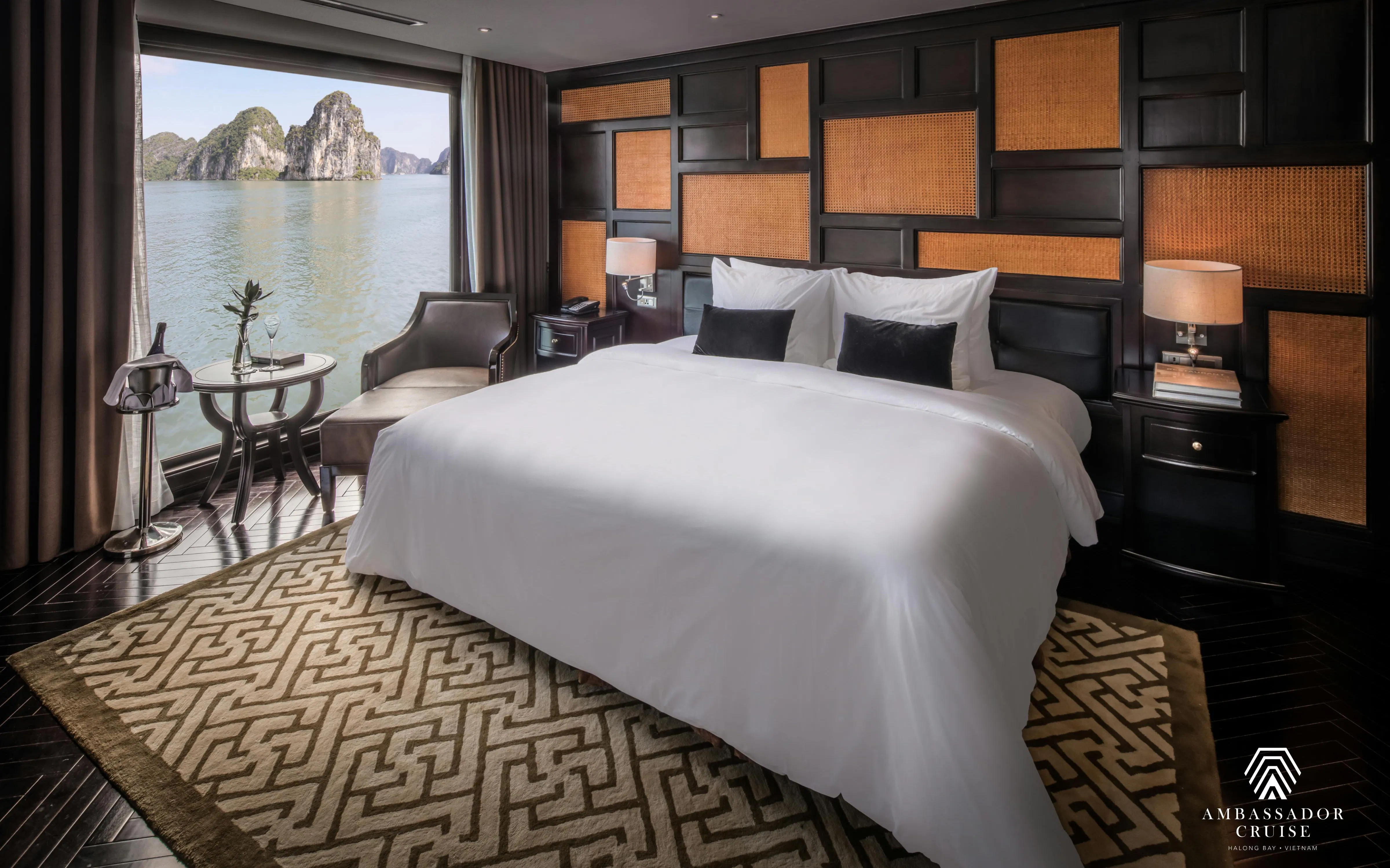 Luxurious cabin with sea view on Ha Long Bay 5-Star Ambassador Cruise, Vietnam.