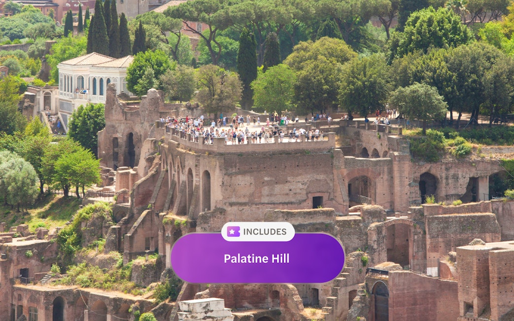 Visitors exploring ancient ruins on Palatine Hill in Rome.