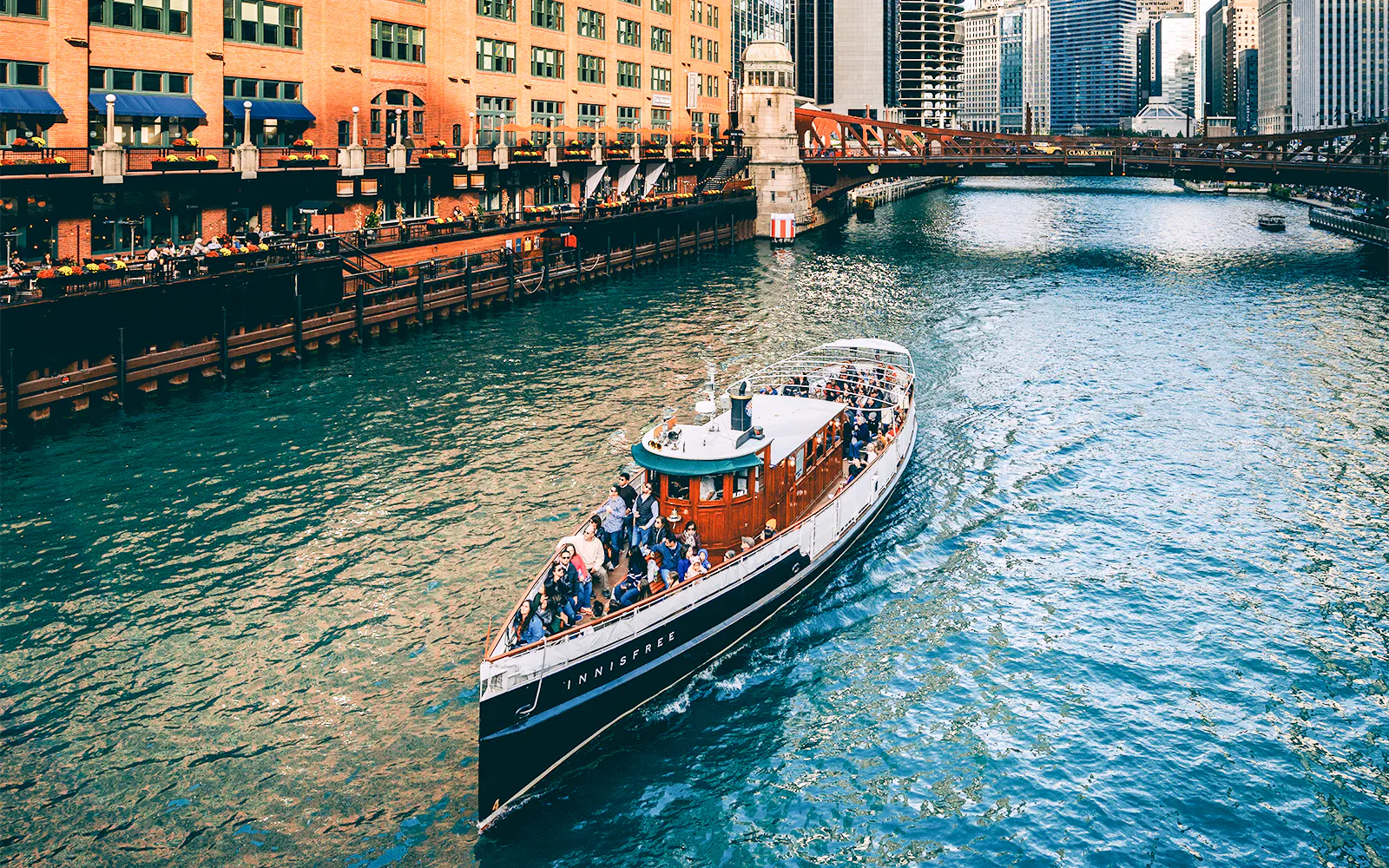 Innisfree boat cruising on Chicago River during architecture tour.