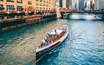 Innisfree boat cruising on Chicago River during architecture tour.