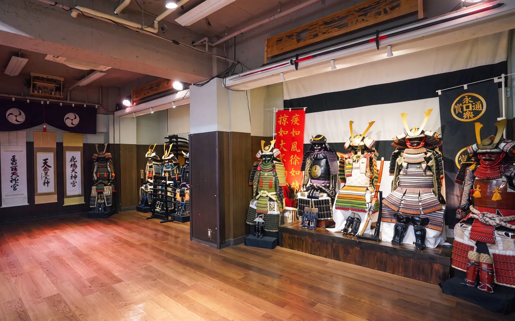 Samurai armor display in Tokyo dojo for swordplay and dining experience.