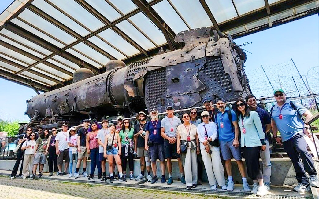 Tourists at Korean War steam locomotive, Imjingak Park, DMZ tour.