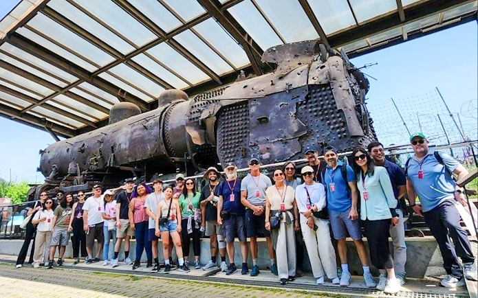Tourists at Korean War steam locomotive, Imjingak Park, DMZ tour.