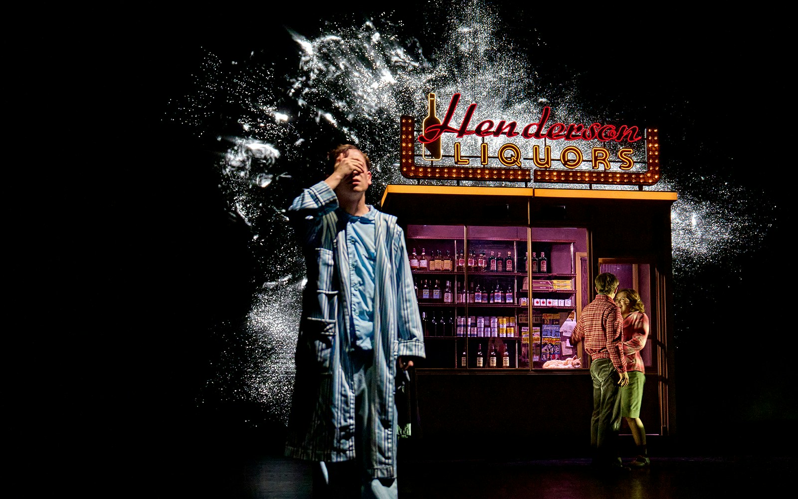 Man in pajamas near Henderson Liquors sign, couple embracing, Stranger Things: The First Shadow.