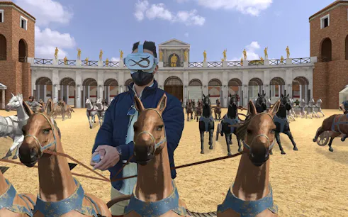 Virtual reality chariot race at Circus Maximus in Rome with headset user.