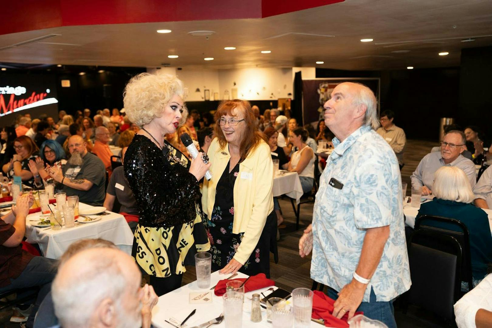 Dinner theater performance at Marriage Can Be Murder, Las Vegas, with audience interaction.