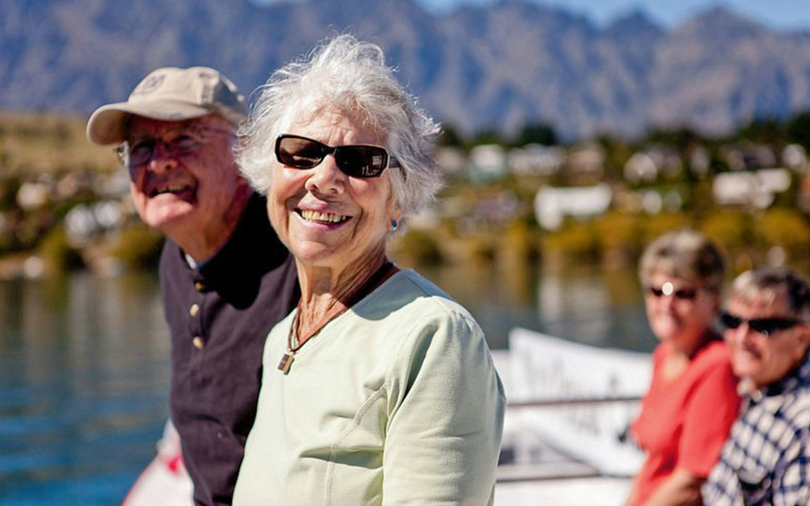 Lake Wakatipu cruise boat with scenic mountain views, Queenstown, New Zealand.