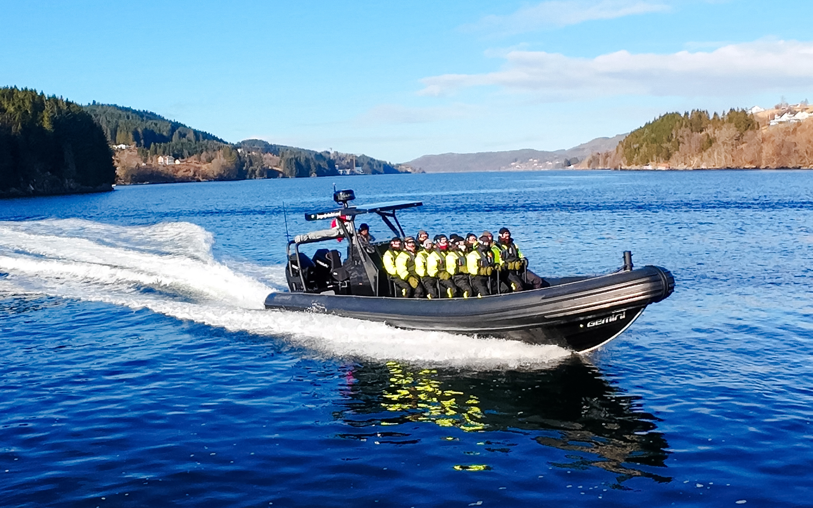 Guests on a RIB boat during Alversund Fjord Safari, Norway.