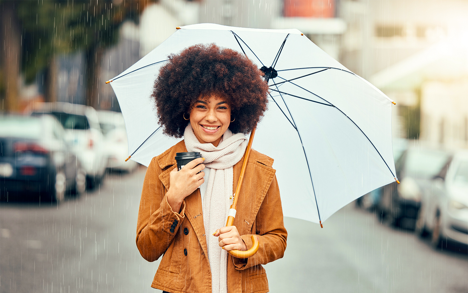 Woman holding an umbrella in a naples