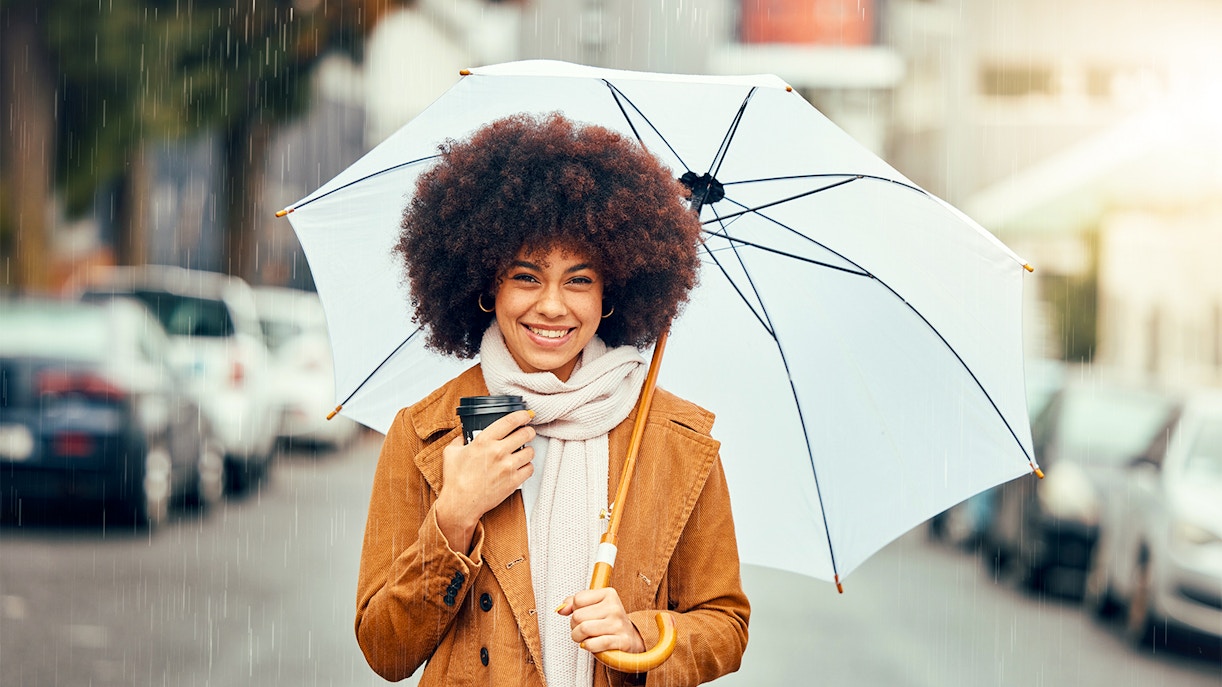 Woman holding an umbrella in a naples