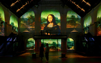 Leonardo da Vinci's Mona Lisa projected at Fabrique des Lumières exhibition.