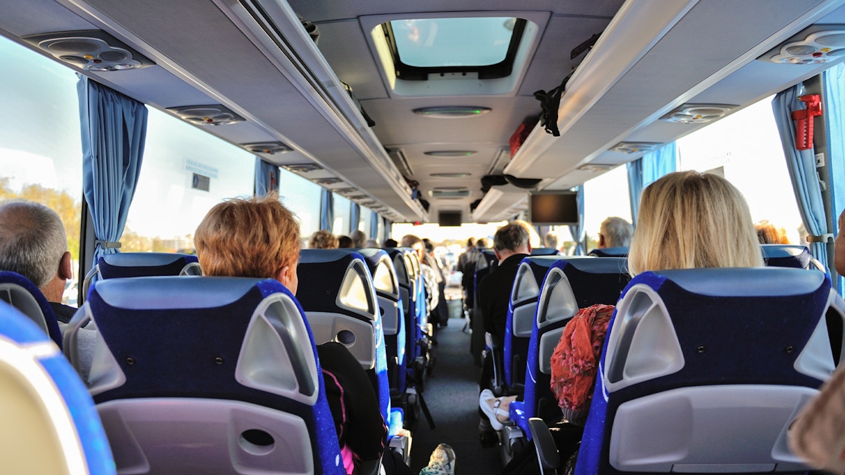 Bus interior with passengers traveling from Tromso to Skjervoy.