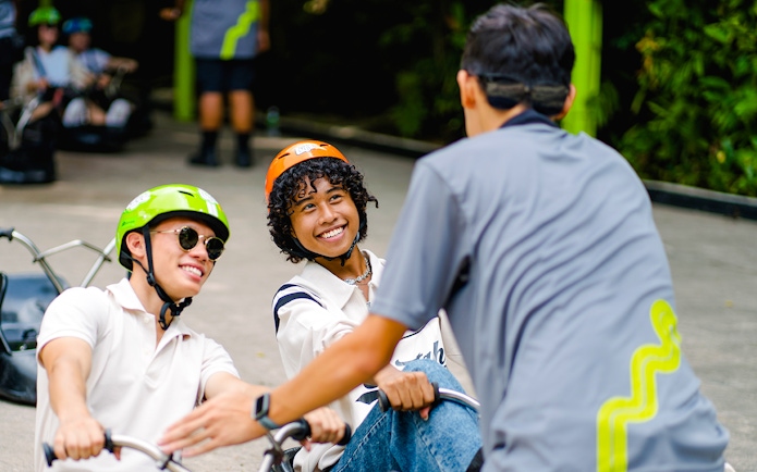 Friends enjoying the Skyline Luge ride in Singapore.