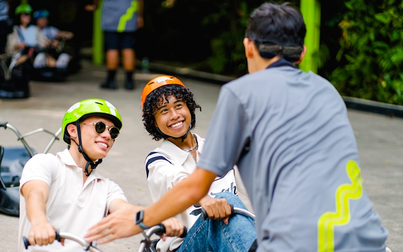 Friends enjoying the Skyline Luge ride in Singapore.