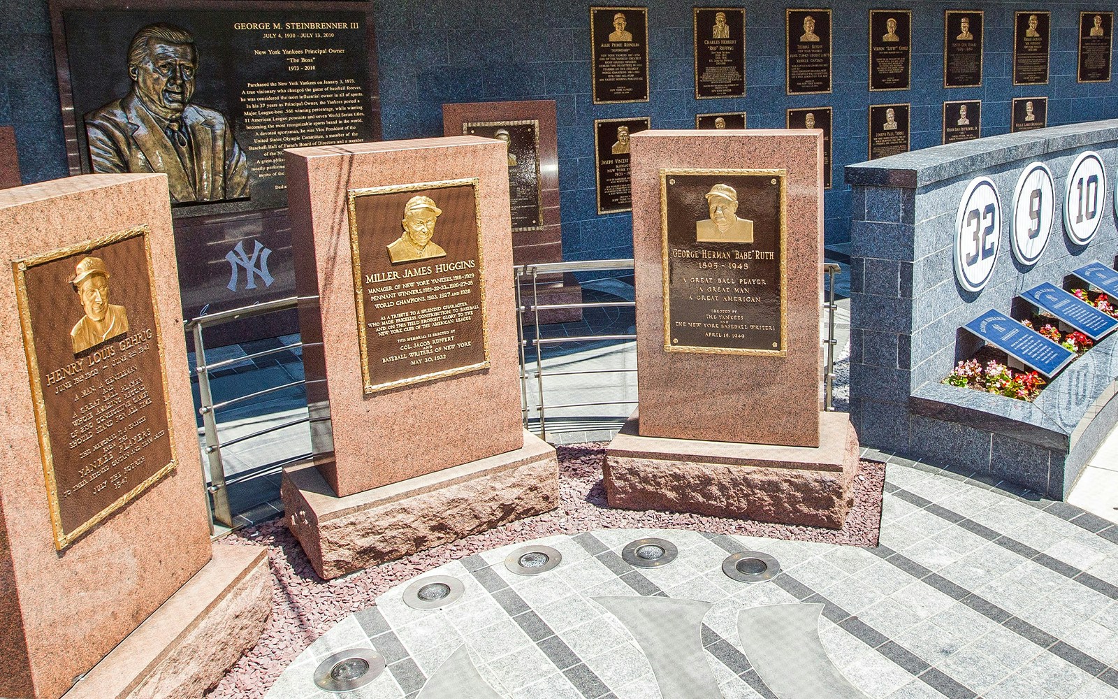 Monuments of Yankees legends at Monument Park, Yankee Stadium, New York.