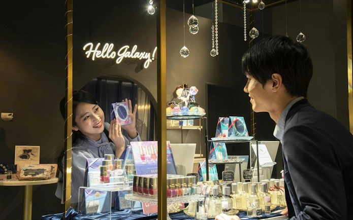 Shopping at Konica Minolta Planetaria TOKYO Ginza, featuring cosmetics and souvenirs.