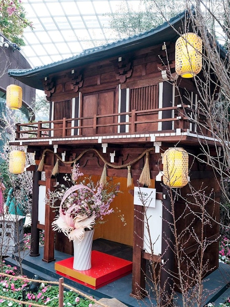 Traditional Japanese structure with cherry blossoms at Gardens by the Bay Sakura event.