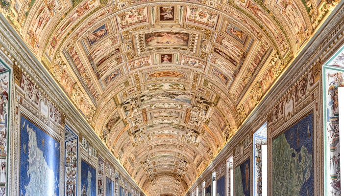 Vatican Museums' ornate ceiling and map gallery, Rome.