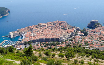 Aerial view of Dubrovnik's Old Town and city walls, Croatia, overlooking the Adriatic Sea.