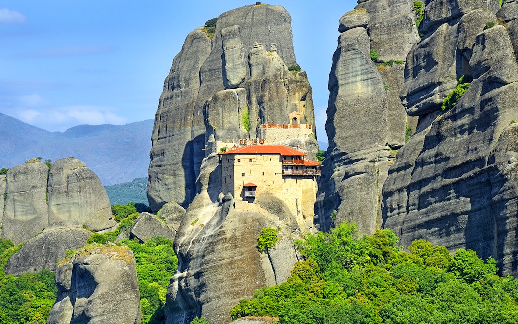 Monastery of Saint Nicholas Anapafsas perched on Meteora rock formations, Greece.