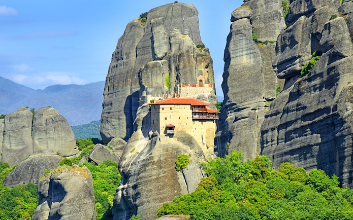 Monastery of Saint Nicholas Anapafsas perched on Meteora rock formations, Greece.