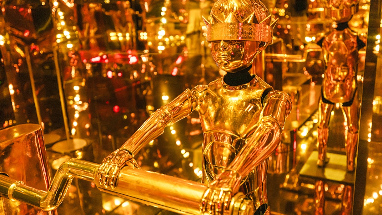 Golden humanoid robot exhibit at Mercer Labs: Museum Of Art & Technology.