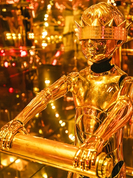 Golden humanoid robot exhibit at Mercer Labs: Museum Of Art & Technology.