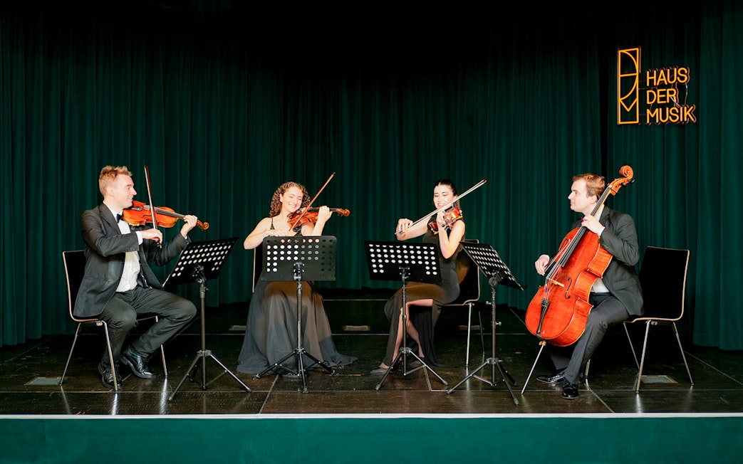 String quartet performing at Haus der Musik during Mozart & Beethoven concert.