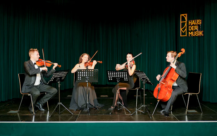 String quartet performing at Haus der Musik during Mozart & Beethoven concert.