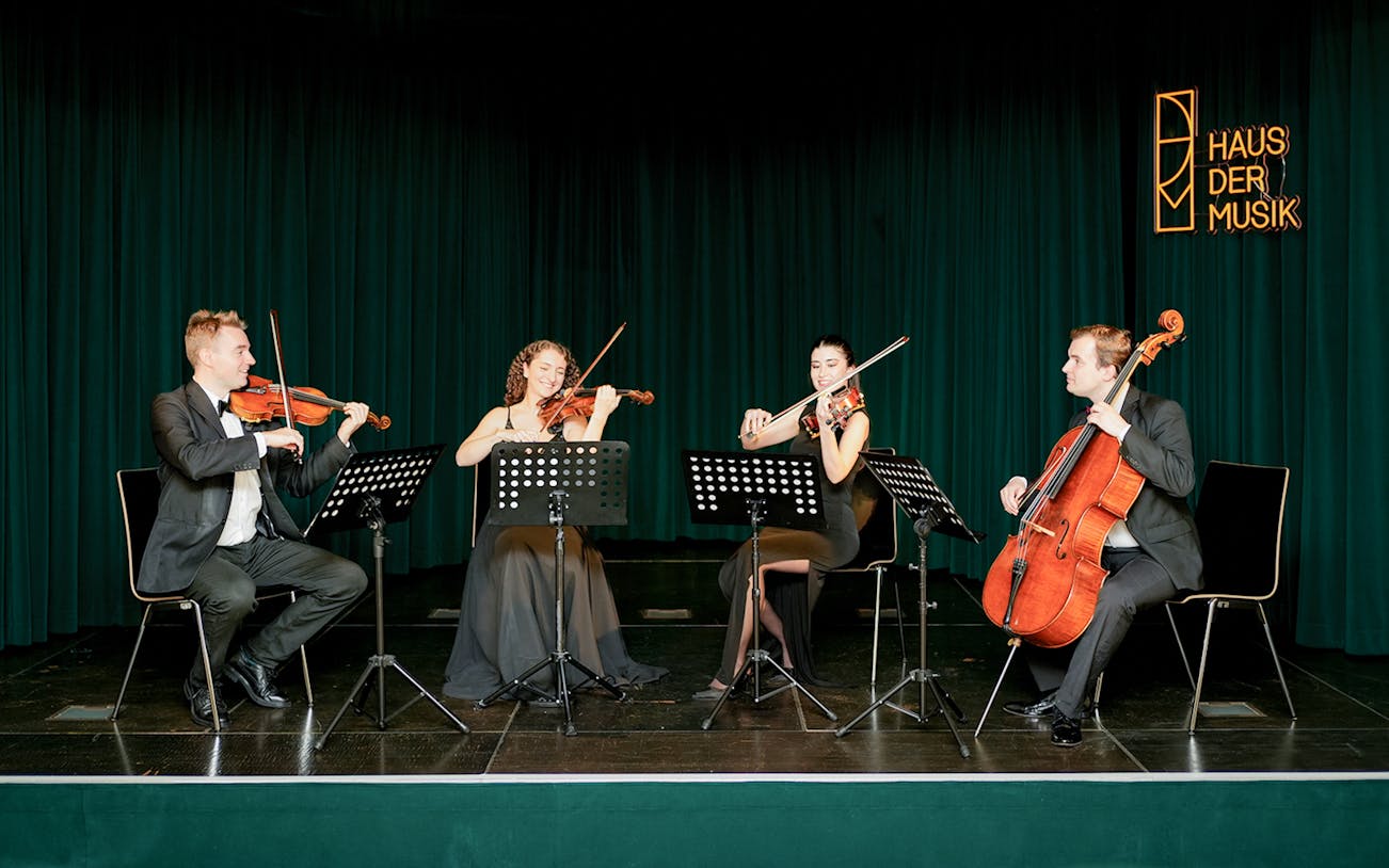 String quartet performing at Haus der Musik during Mozart & Beethoven concert.