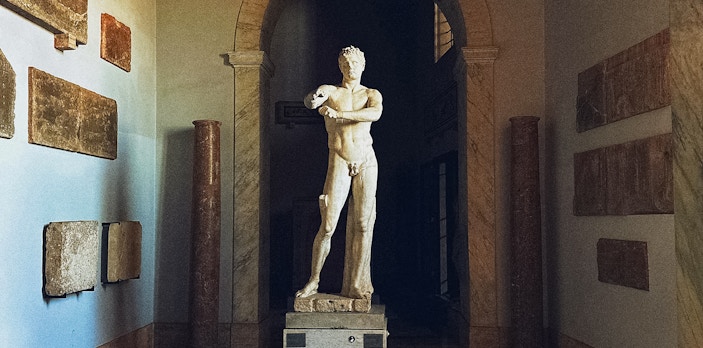 Statue of Apoxyomenos in Pio Clementine Museum, Vatican City.
