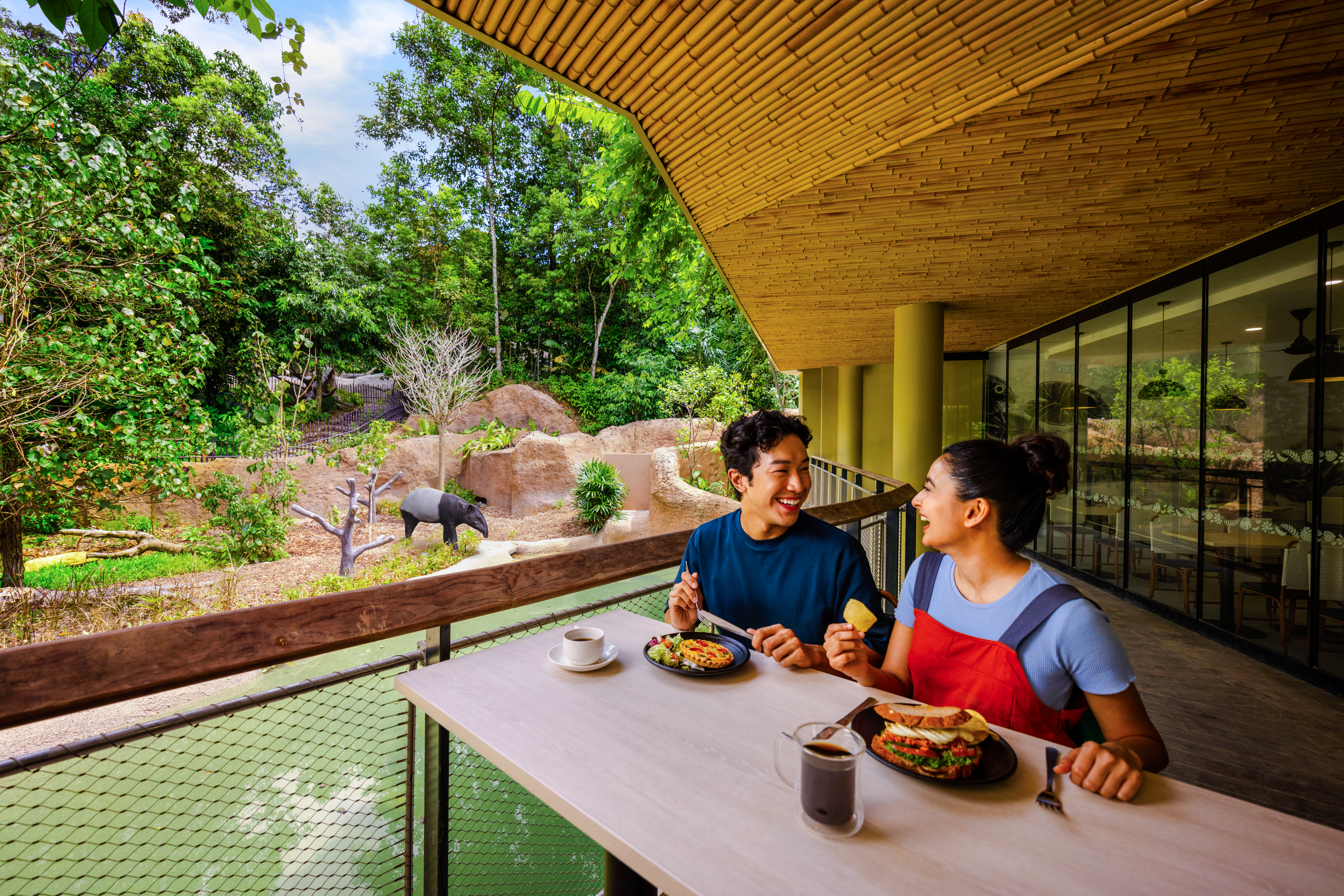 Watering Hole Cafe exterior with outdoor seating in London, England.