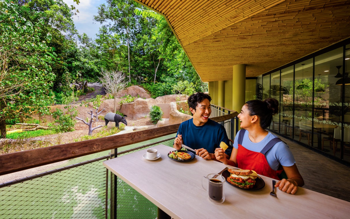 Watering Hole Cafe exterior with outdoor seating in London, England.