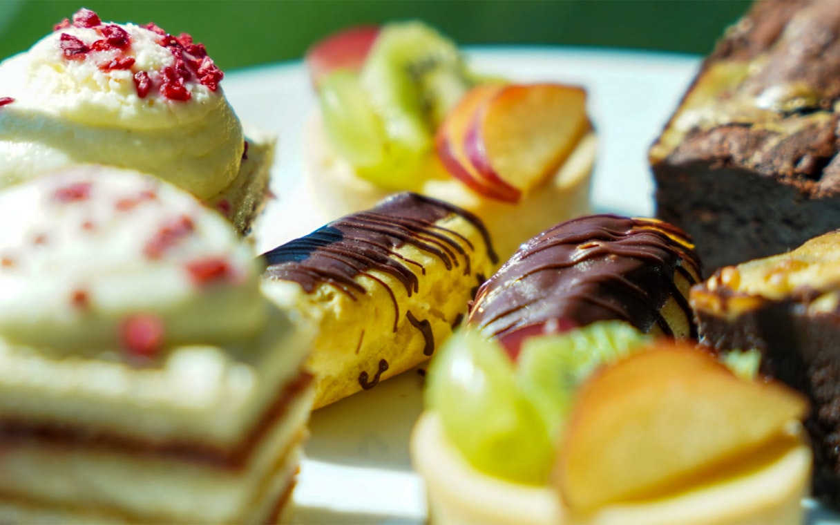 Assorted pastries and cakes on the Afternoon Tea Bus.