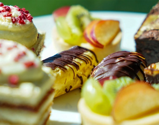 Assorted pastries and cakes on the Afternoon Tea Bus.