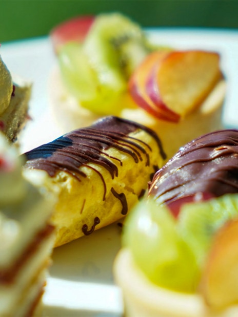 Assorted pastries and cakes on the Afternoon Tea Bus.