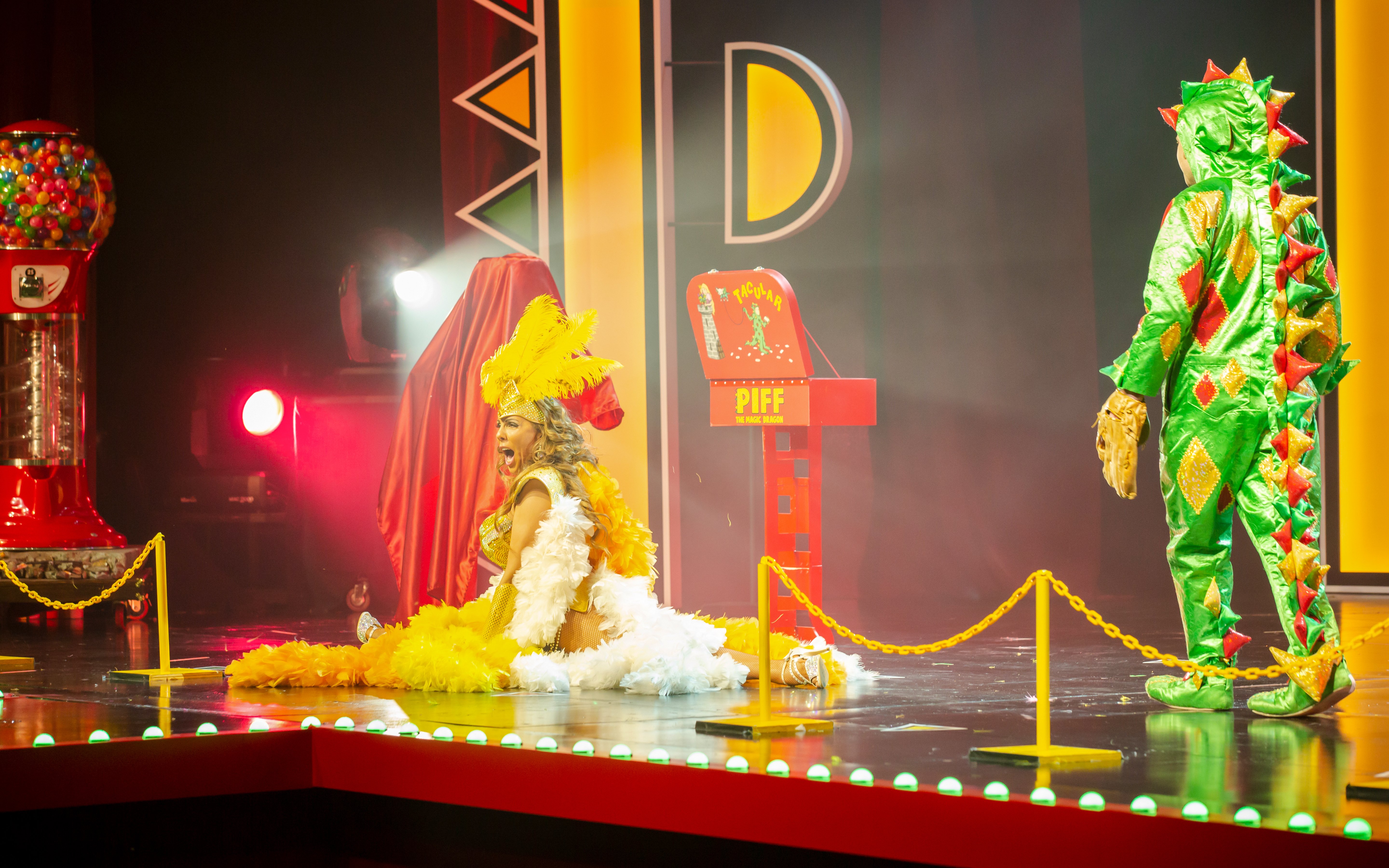 Performer in costume on stage at Piff the Magic Dragon show, Vegas.