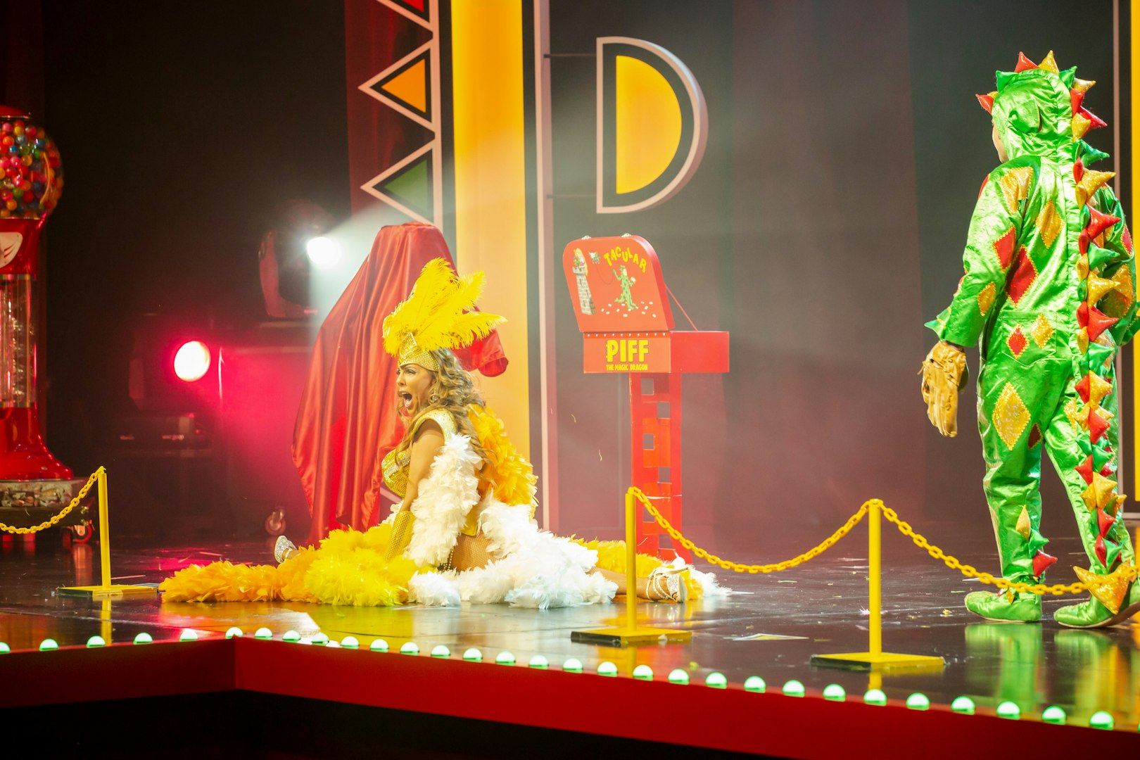 Performer in costume on stage at Piff the Magic Dragon show, Vegas.