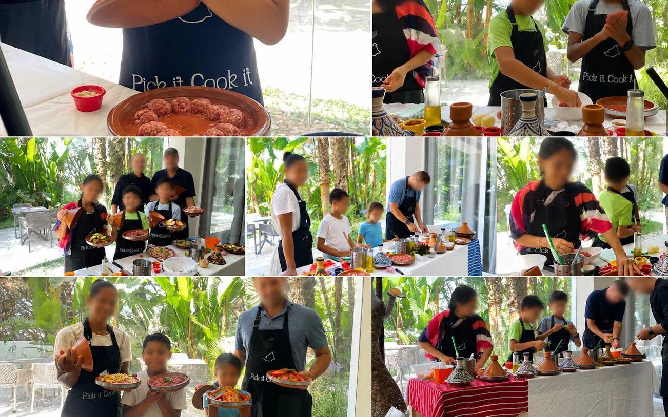 Participants preparing traditional Moroccan dishes at a Tangier cooking class on an organic farm.